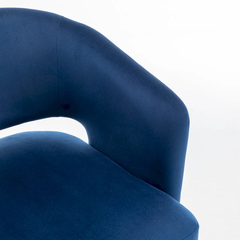 Fauteuil pivotant en velours